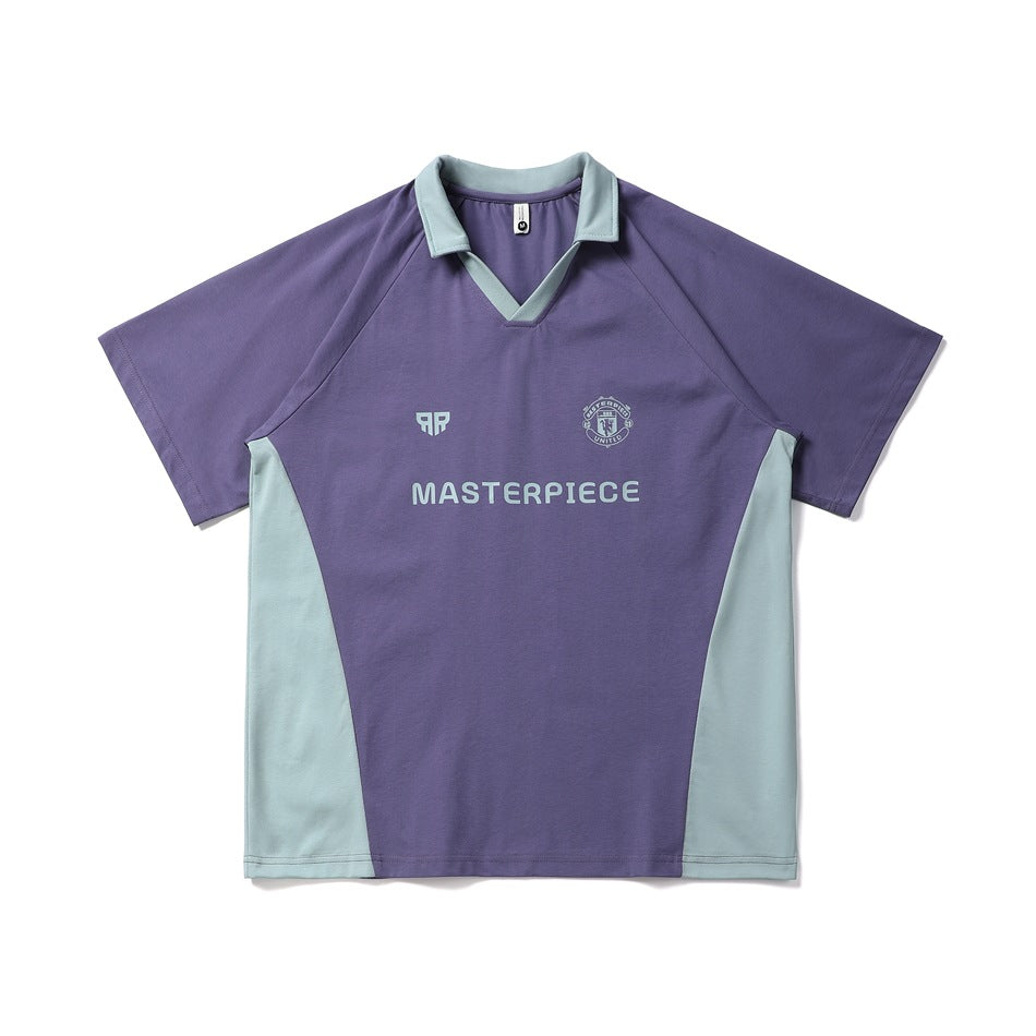 Purple short-sleeve polo-collar jersey top with sage collar, side panels and chest print, flat front view