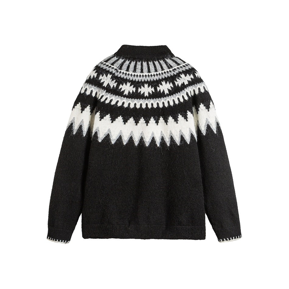 Back view of a black knit sweater with a black-and-white geometric yoke pattern and ribbed collar and cuffs.