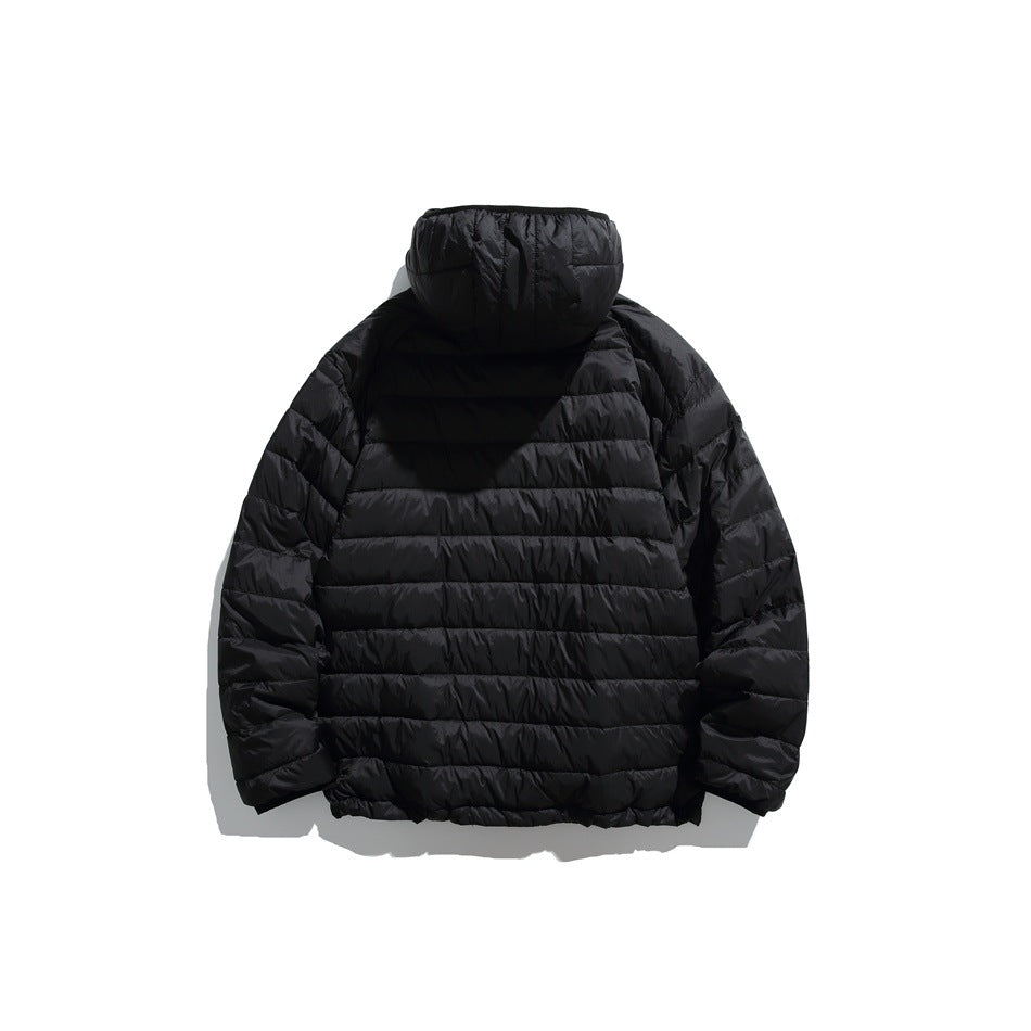 Back view of a black hooded puffer jacket with horizontal quilting.