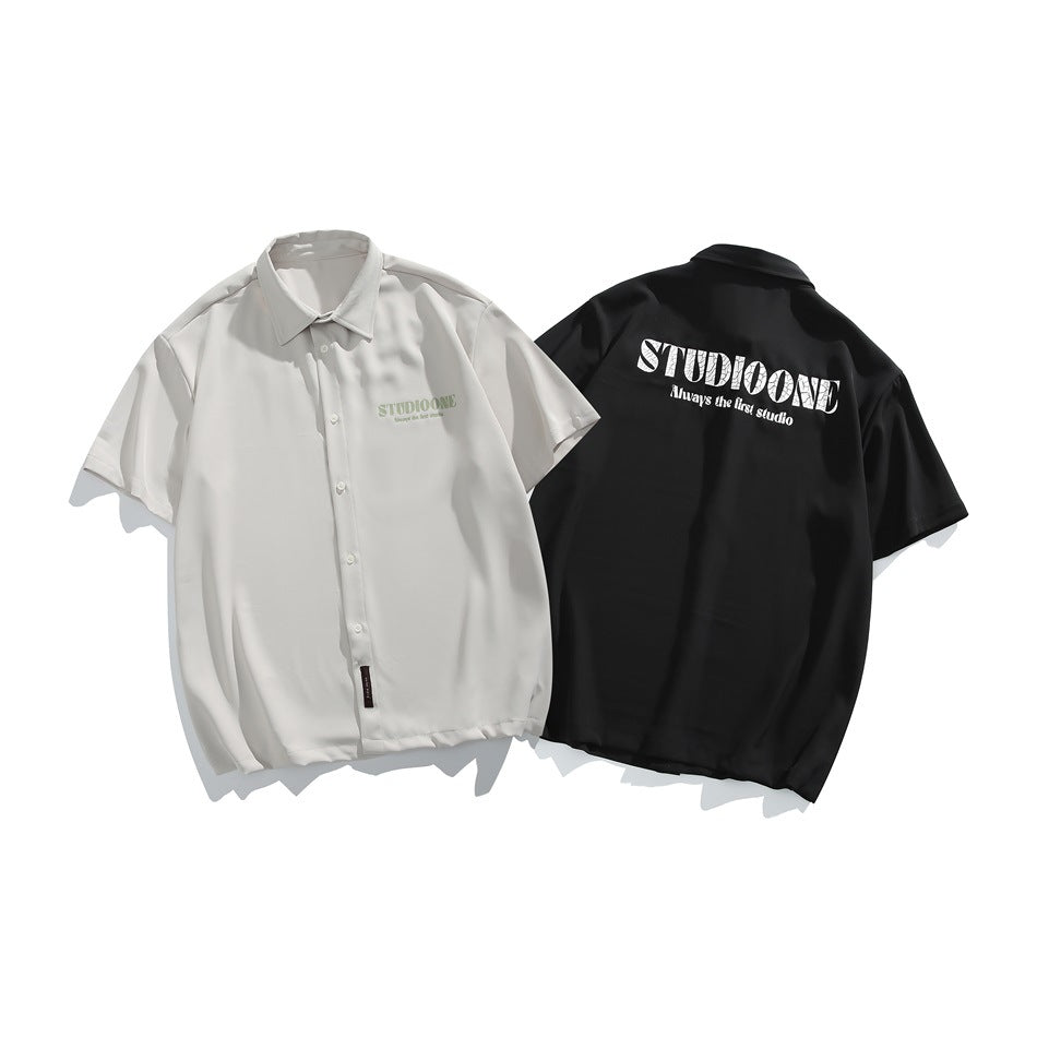 Off-white shirt shown from the front beside a black shirt shown from the back; both have short sleeves and lettering.