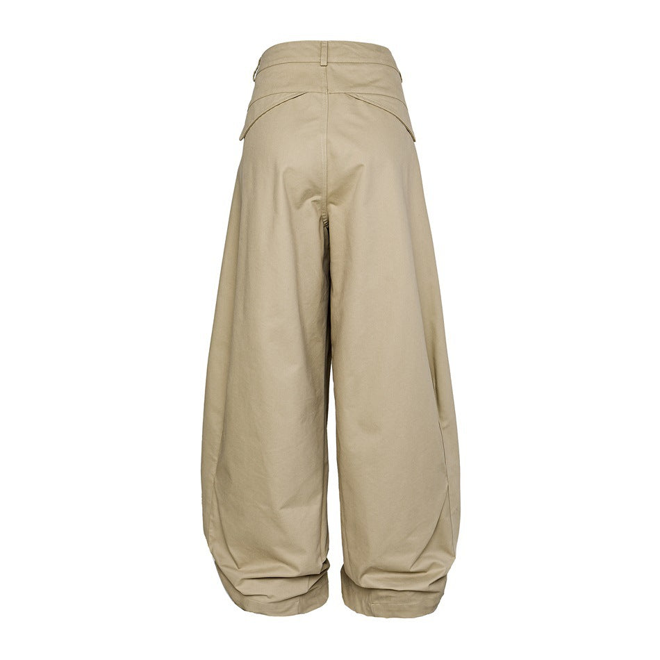 Back view of beige wide-leg trousers with a high waistband, belt loop and gathered ankle cuffs.