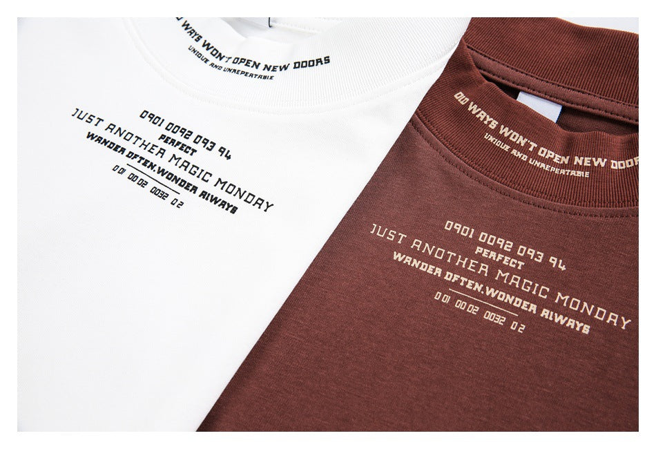 White and burgundy T-shirts shown together, both with printed chest text and matching text inside the collars.