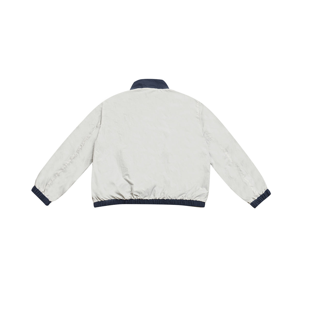 Back view of a pale jacket with a navy collar, cuffs, and hem.