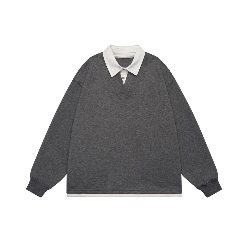 Dark gray long-sleeve sweatshirt with white polo collar, two-button placket, ribbed cuffs and white layered hem, flat lay