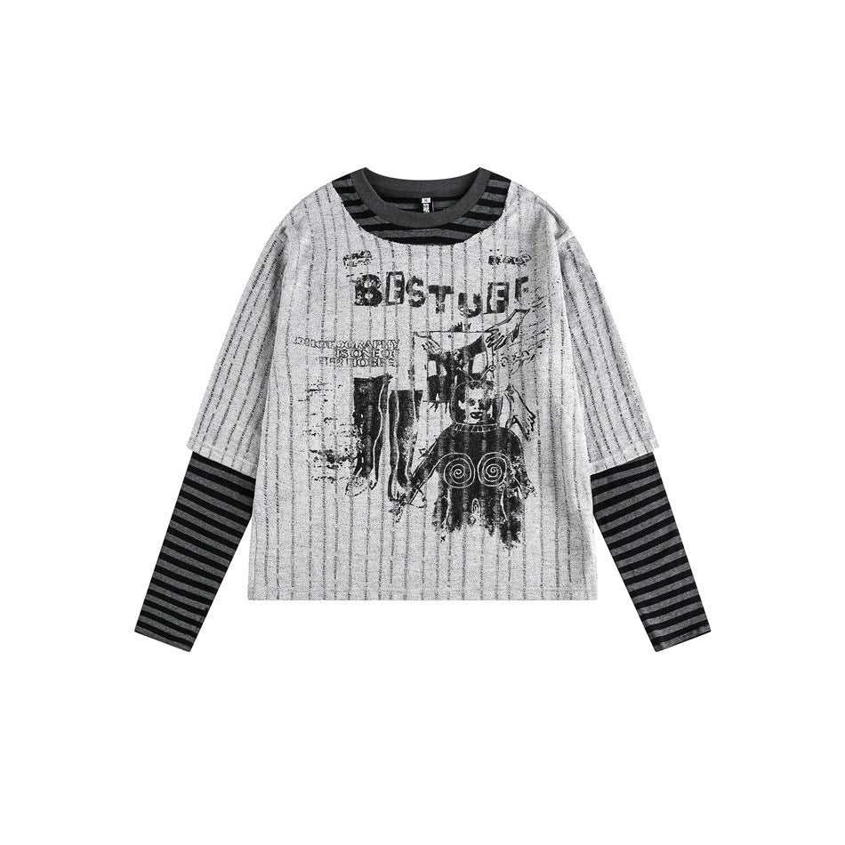 Gray long-sleeve layered-look top with black graphic print and striped sleeves on a white background