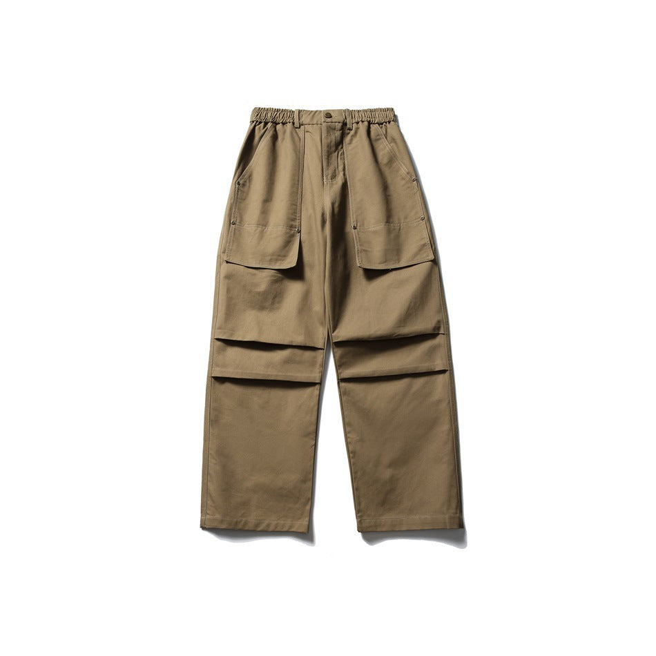 Khaki wide-leg pants with elastic waist, large front patch pockets and knee pleats, flat front view