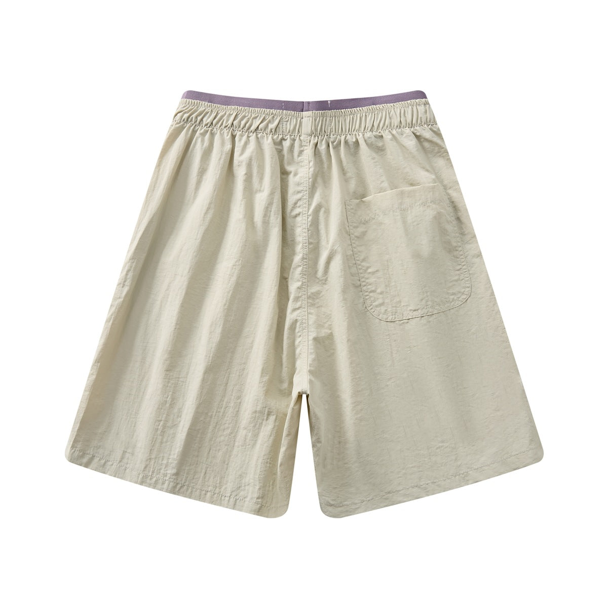 Light beige shorts shown from the back, with an elastic waistband and a large patch pocket.