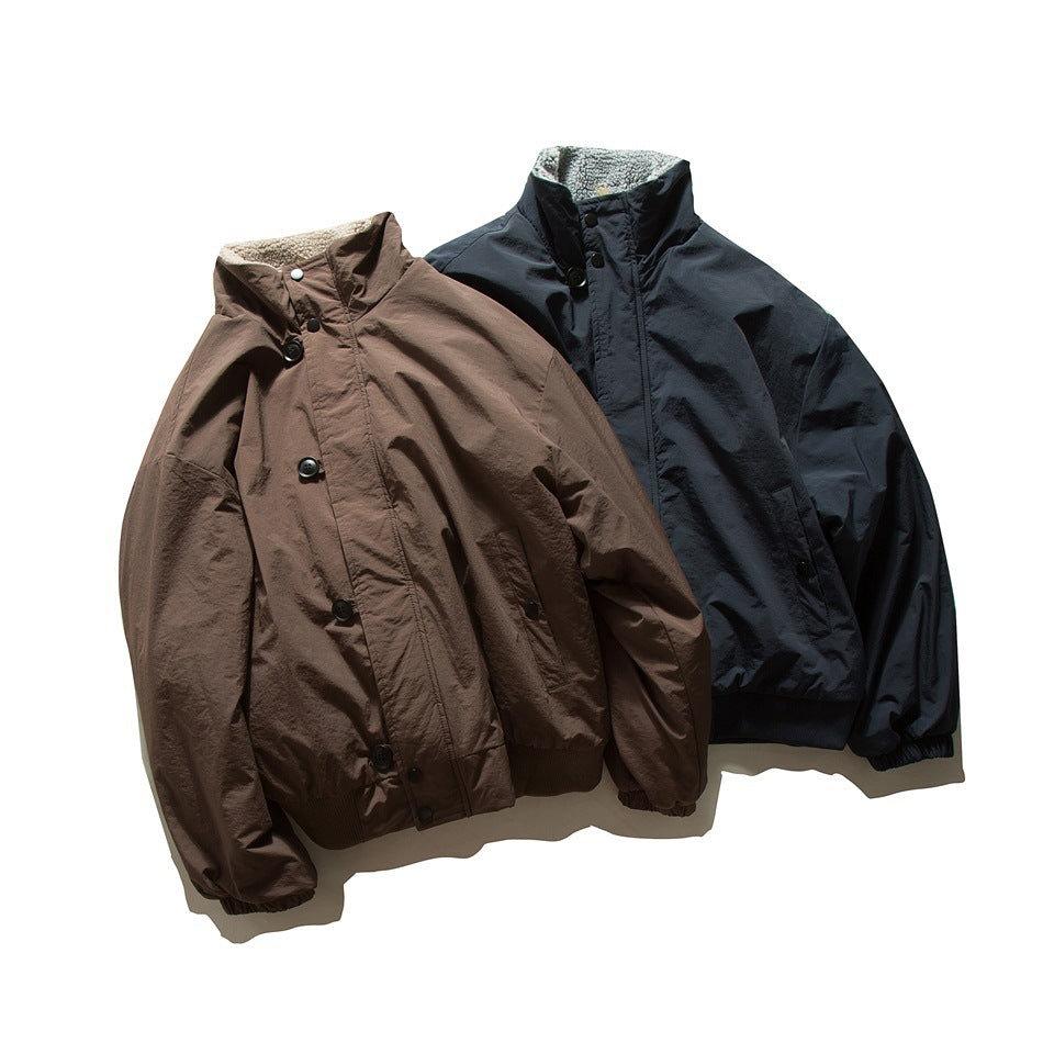 Brown and dark navy high-collar jackets displayed together, with light curly lining visible at the collars.