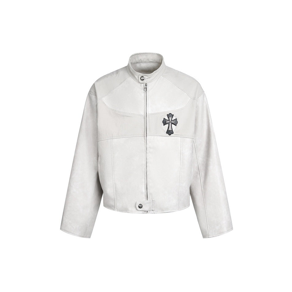 Light gray cropped stand-collar zip jacket with a black and silver cross patch on the chest, front flat view