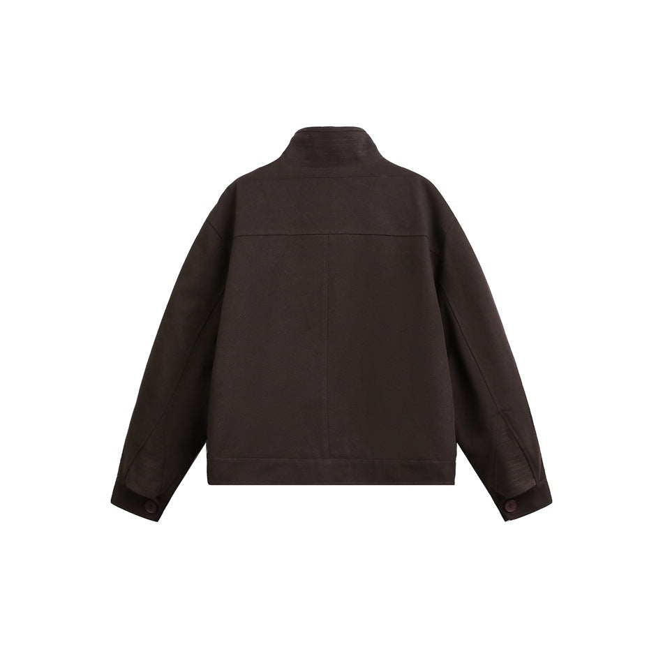 Back view of a dark brown jacket with a stand collar, center seam, long sleeves, and buttoned cuffs.