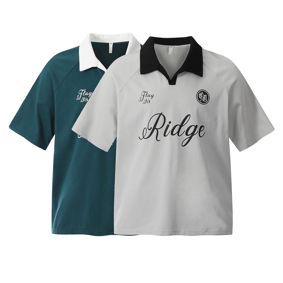 Two short-sleeve polo shirts shown together: light gray with a black collar and teal with a white collar; both have script