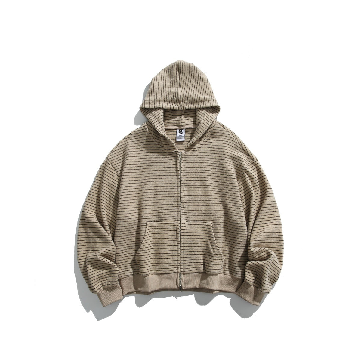 Apricot zip-up hoodie with fine dark horizontal stripes, front pocket and ribbed hem, laid flat