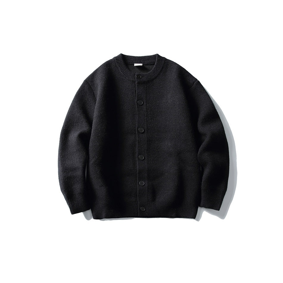 Black knit button-front cardigan with ribbed crew neck, cuffs and hem, flat lay front view