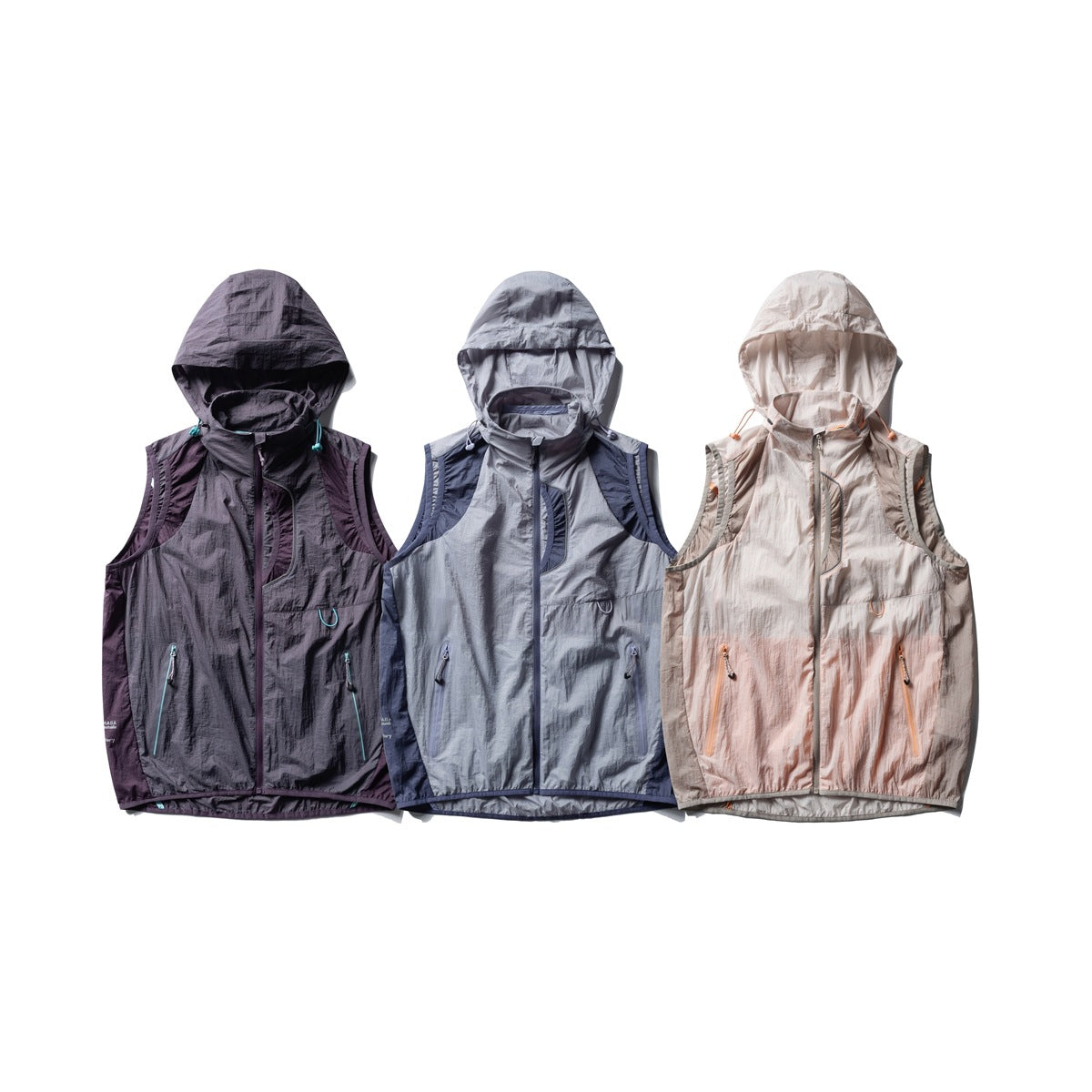 Three hooded sleeveless zip vests displayed together in dark plum, blue-gray, and pale pink.