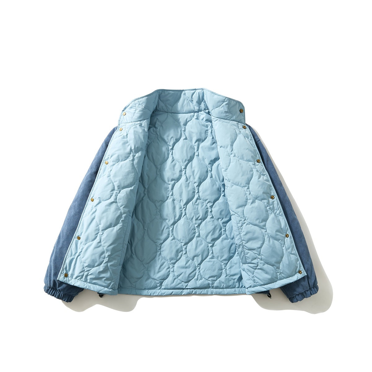 Pale blue quilted jacket opened to show its interior lining, snap fasteners, and dark blue sleeves.