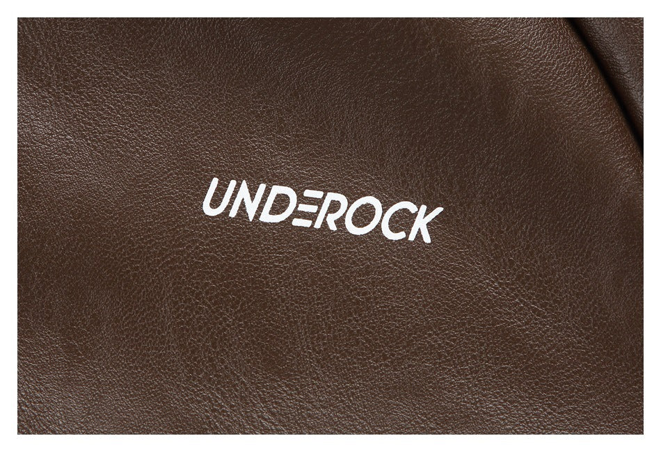 Close-up of a white UNDEROCK logo printed on brown textured jacket material.