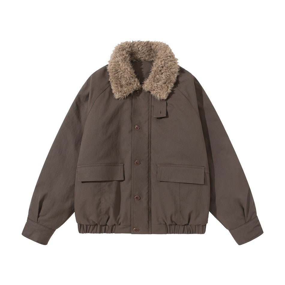 Brown bomber-style jacket with fluffy textured collar, two flap pockets, button front and elastic hem, flat lay