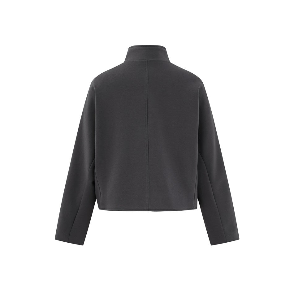 Back view of a charcoal cropped jacket with a stand collar, long sleeves, and a center seam.