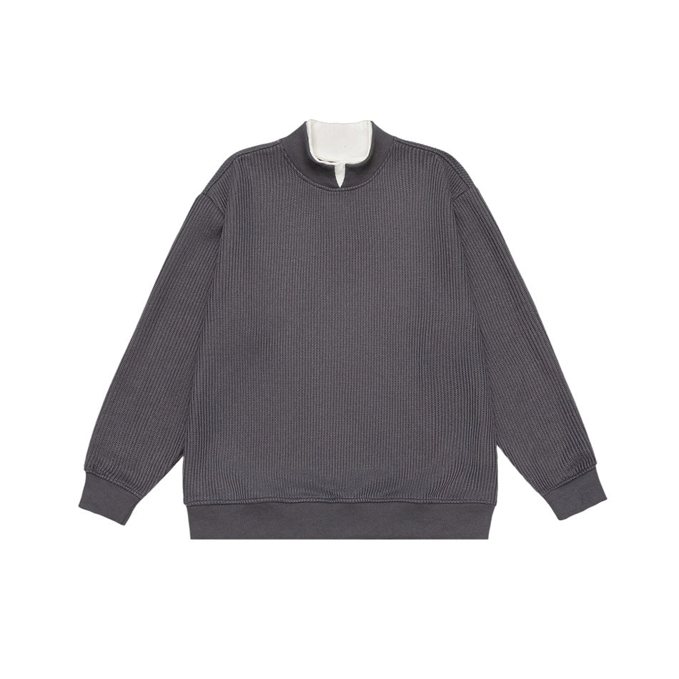 Charcoal gray ribbed knit-look pullover with white inner collar layer, flat front view