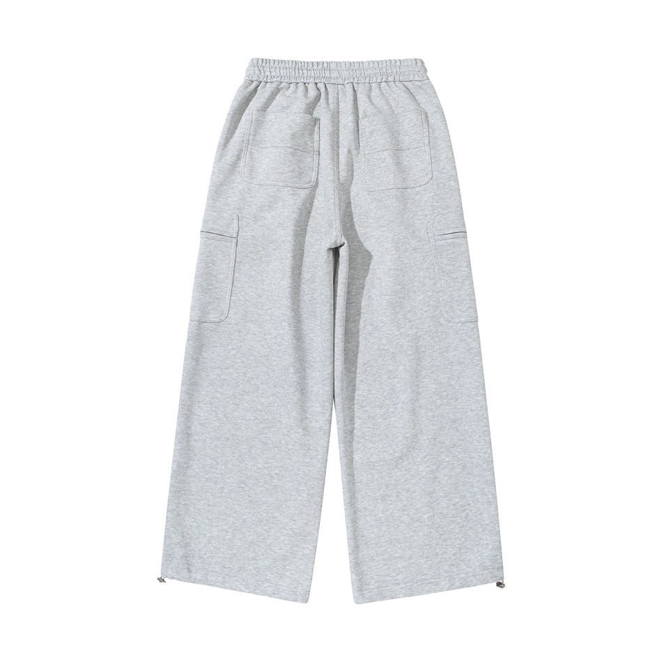 Back view of light heather gray wide-leg sweatpants with two patch pockets and side cargo pockets