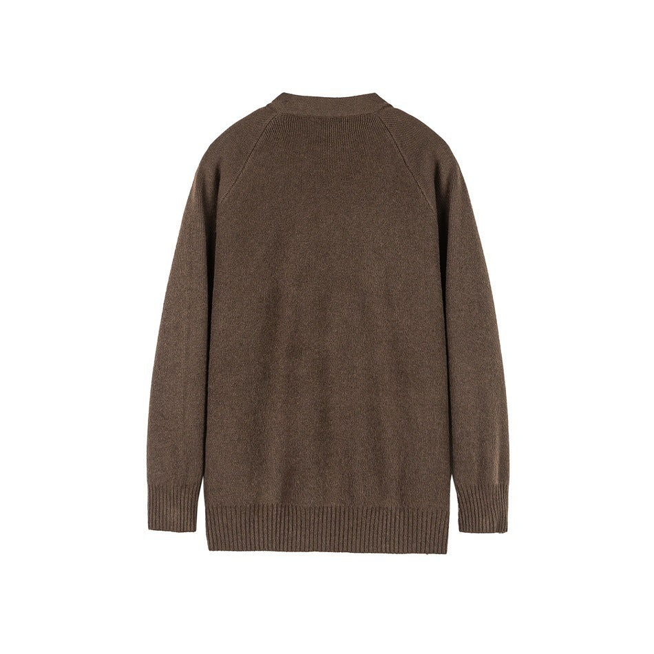 Back view of a brown knit cardigan with raglan seams, long sleeves, and ribbed cuffs and hem.