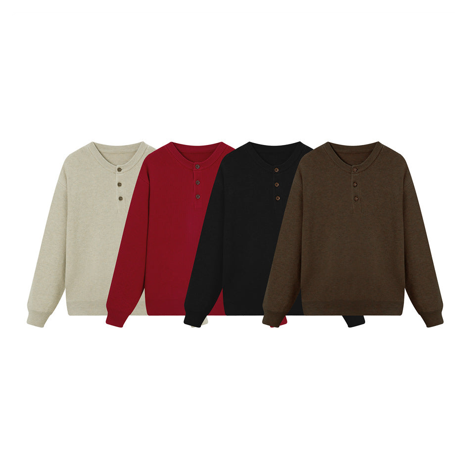 Four ribbed long-sleeve button-neck sweaters shown from the front in cream, red, black, and brown.