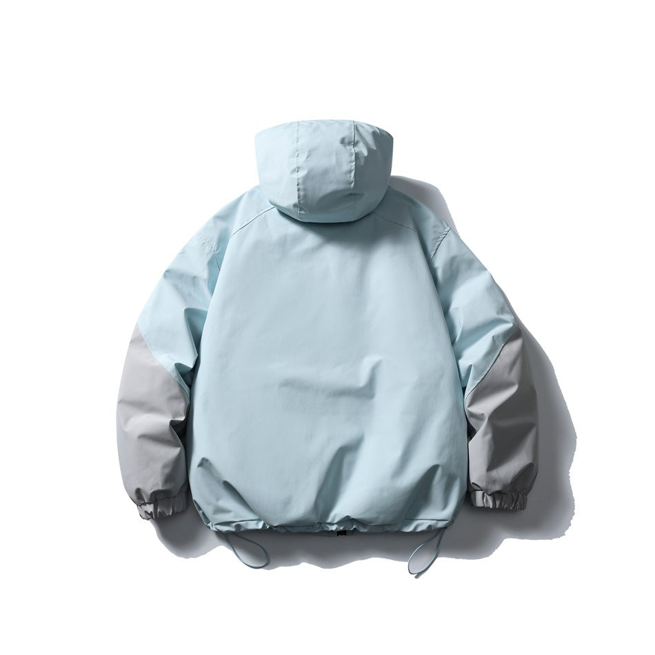 Back view of a pale blue hooded jacket with gray sleeve sections, elastic cuffs, and adjustable drawcord hem.