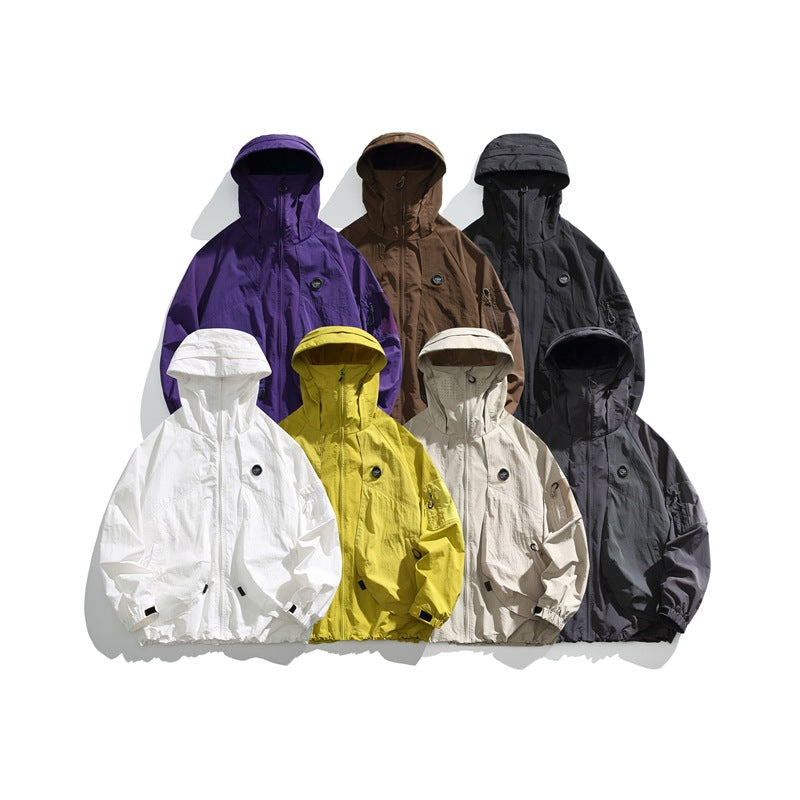 Six hooded jackets displayed together in purple, brown, black, white, yellow, and light gray.