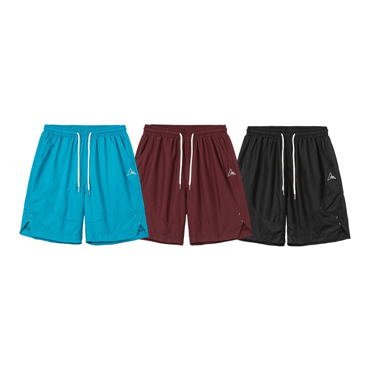Front view of drawstring shorts in turquoise, burgundy, and black, each with a small embroidered emblem.