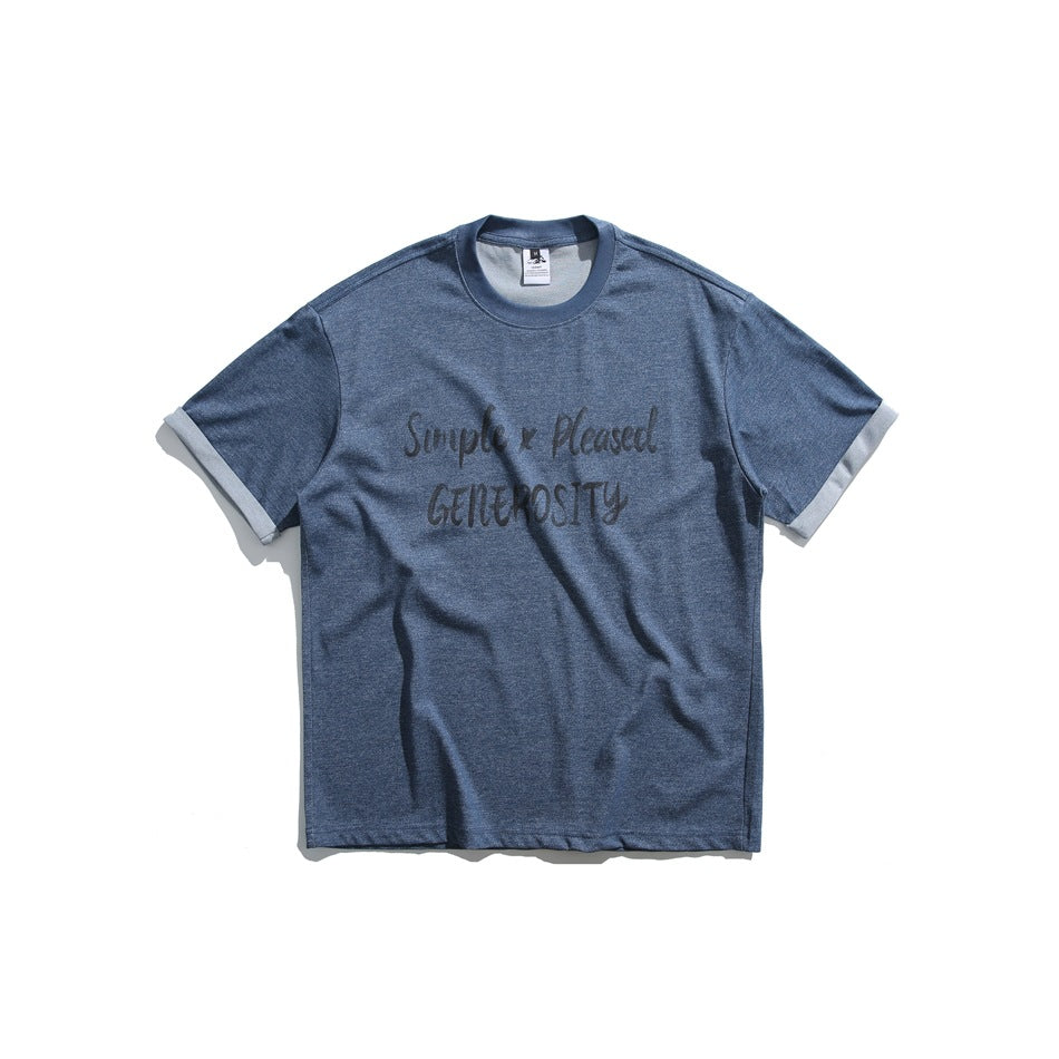 Blue heathered crew-neck T-shirt with rolled sleeve cuffs and a black script chest print, flat lay