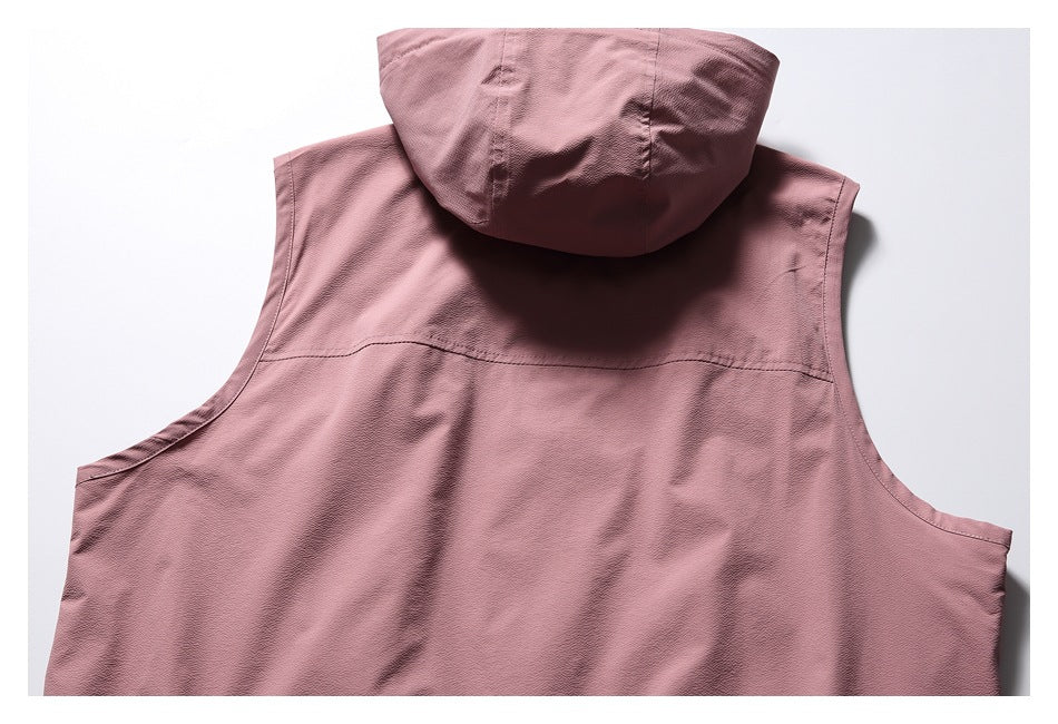 Back view of a dusty rose sleeveless hooded vest laid flat on a white background.