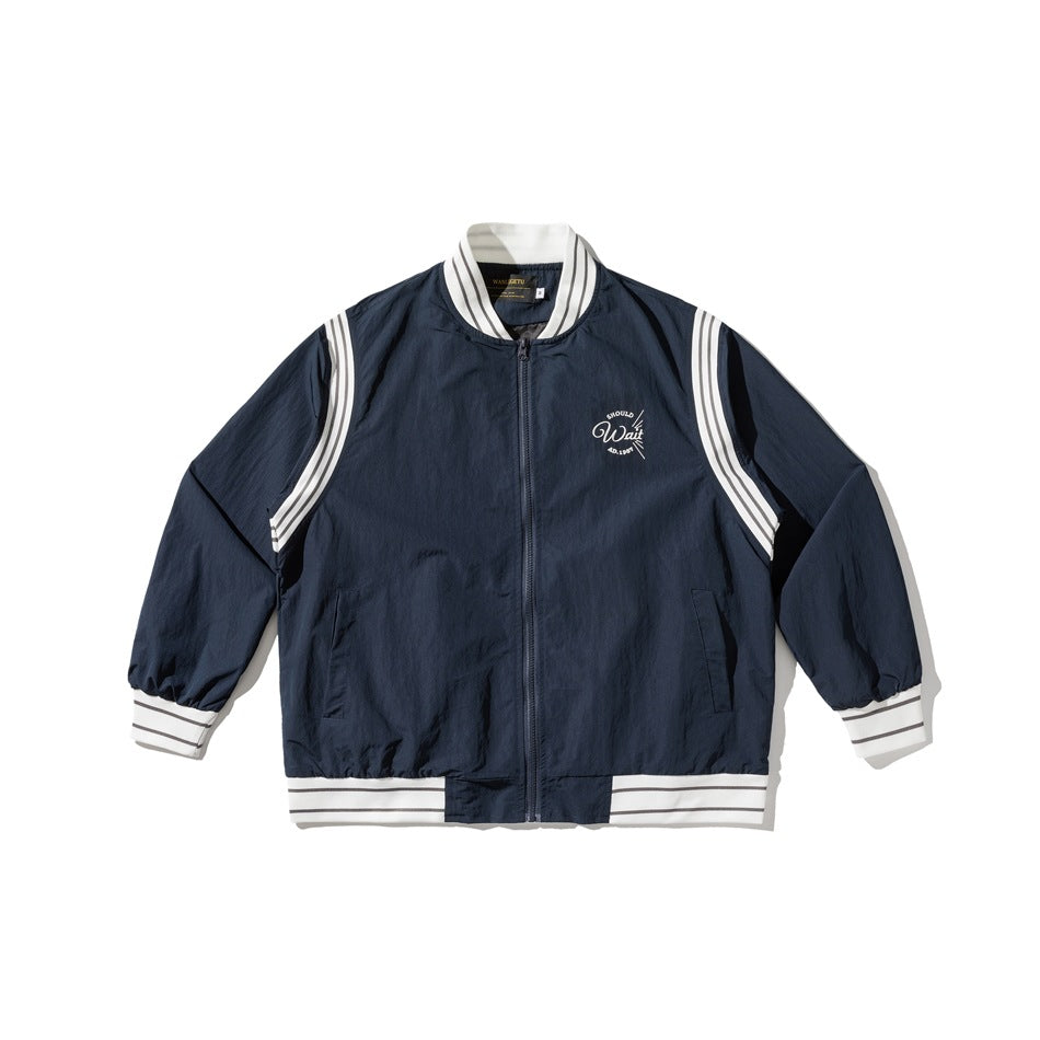 Navy zip-front bomber jacket with white striped collar, cuffs, hem and shoulder panels, flat lay