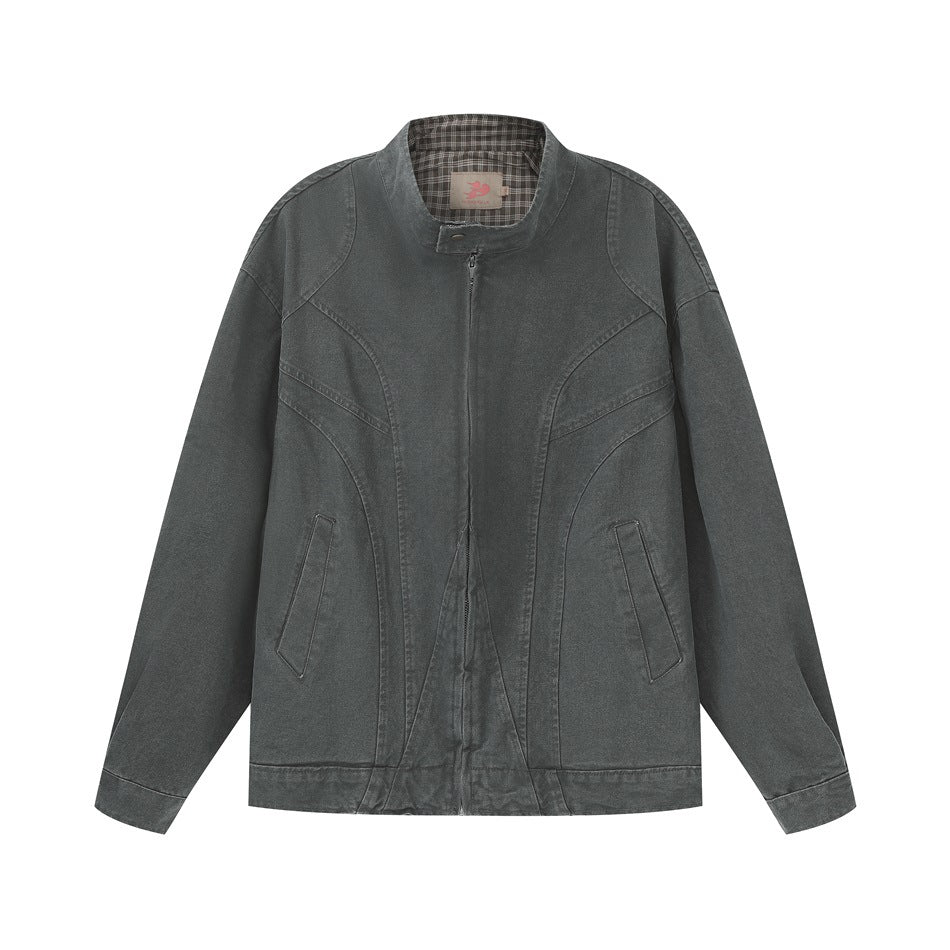 Dark green washed zip-up jacket with stand collar, curved panel seams, slanted pockets and plaid collar lining, flat lay