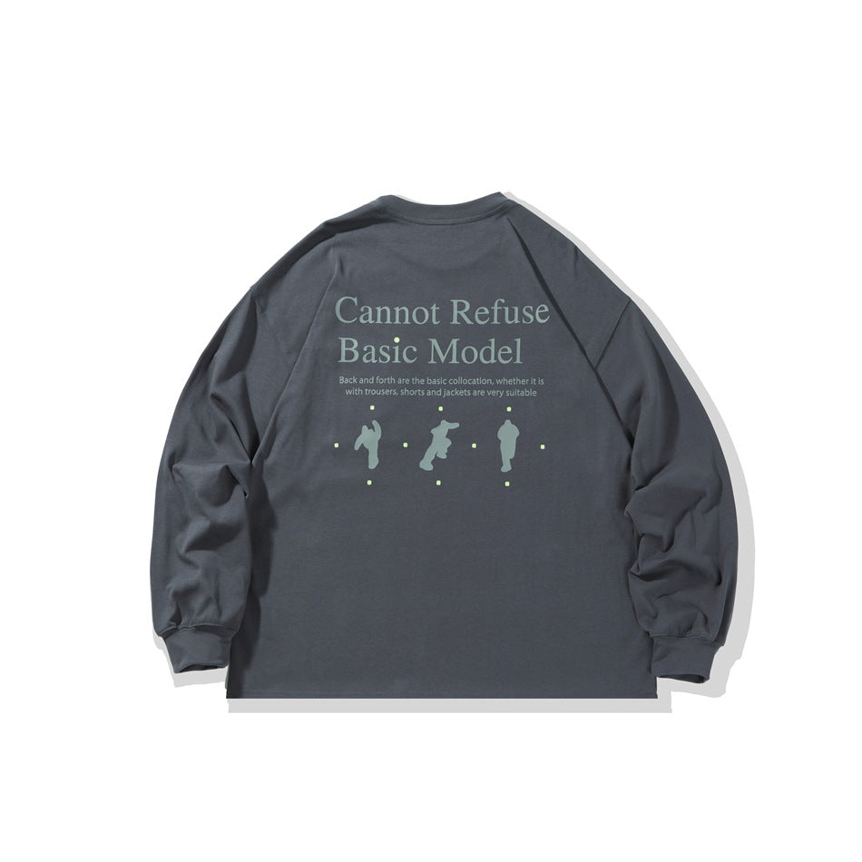 Back of gray long-sleeve crew-neck top with green-gray 'Cannot Refuse Basic Model' print and three figure silhouettes