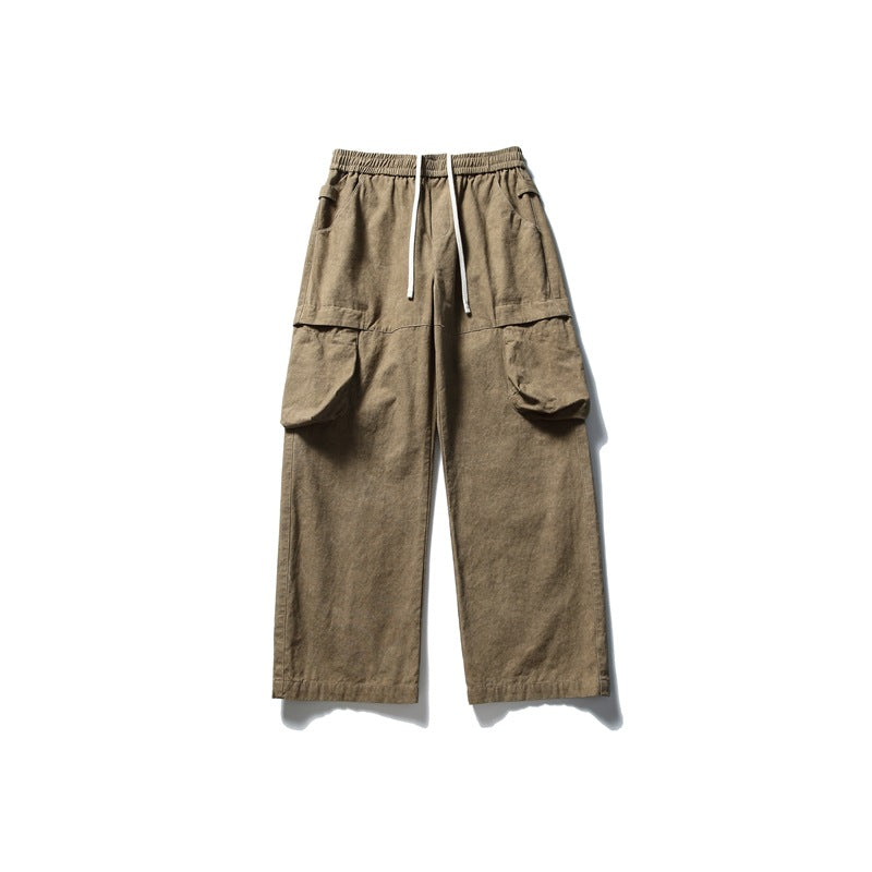Brown wide-leg cargo pants with drawstring elastic waist and large side cargo pockets, flat lay front view