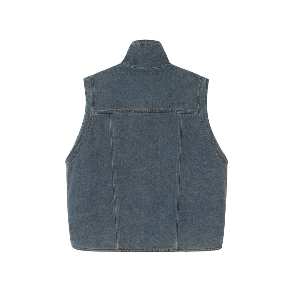 Back view of a blue denim sleeveless vest with a raised collar and simple panel seams.