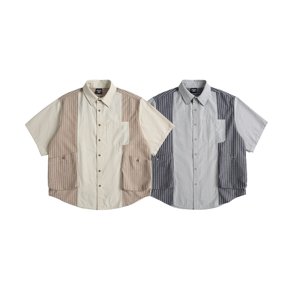 Two short-sleeve button-up shirts shown from the front in beige and gray colorways, with striped panels and pockets.
