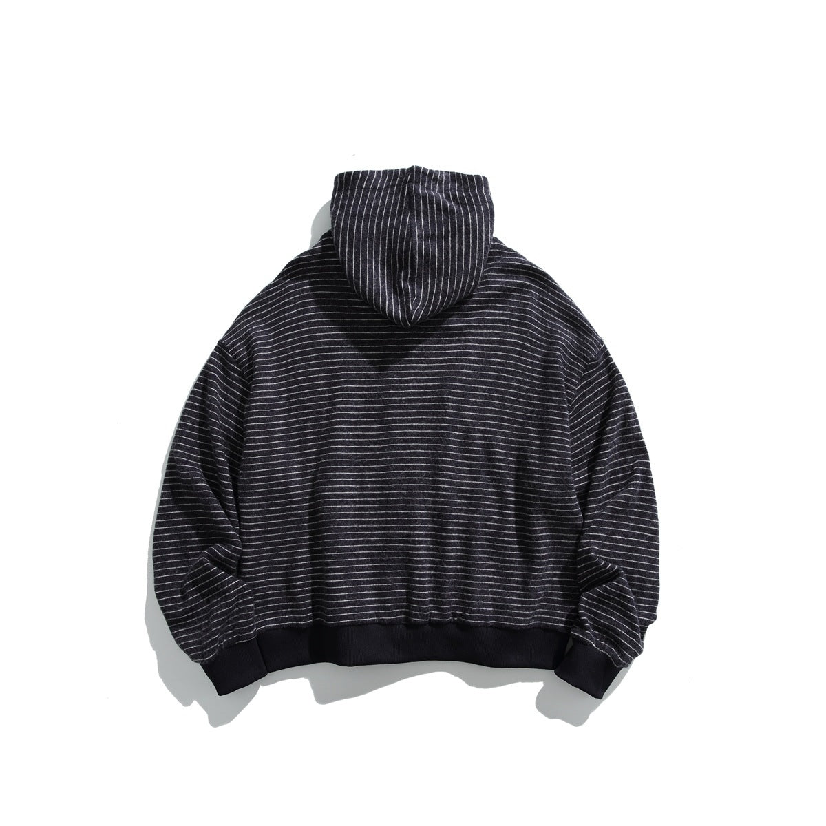 Back view of a charcoal hoodie with fine light stripes and dark ribbed cuffs and hem.