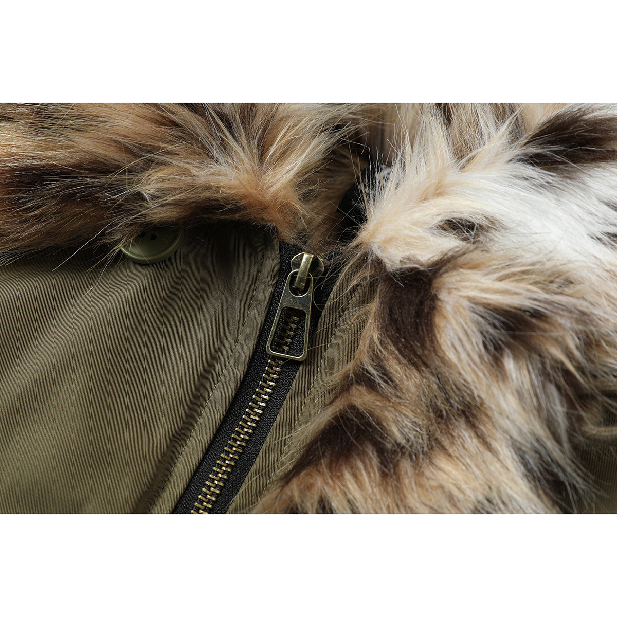 Close-up of an olive jacket's zipper and button beneath a tan, brown, and cream faux-fur collar.