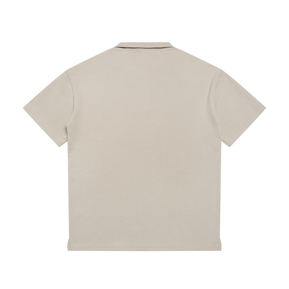 Back view of a plain beige short-sleeve polo shirt on a white background.
