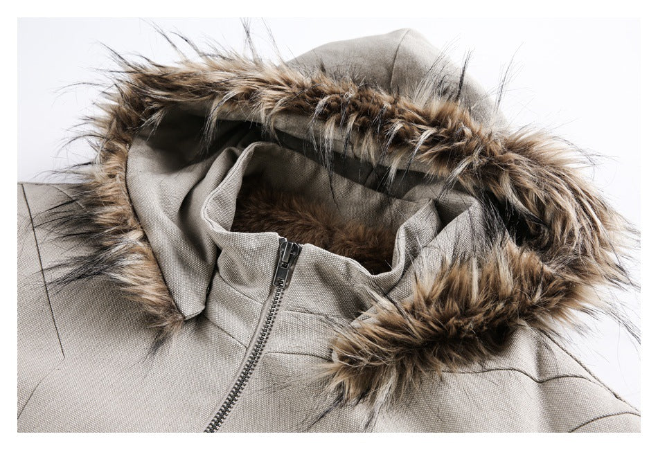 Close-up of the light taupe jacket's hood, showing brown fur trim, inner lining and zipper.