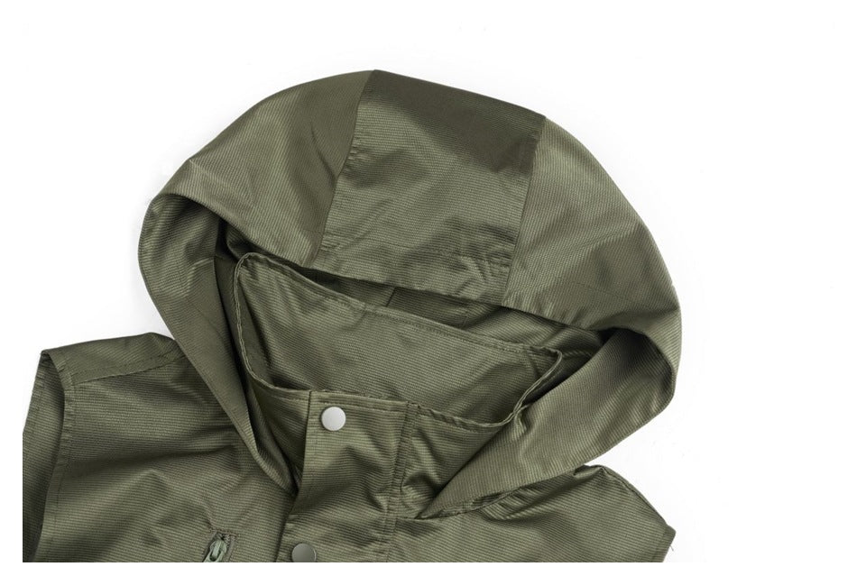 Close-up of the olive-green vest's large hood, collar, and snap closure.