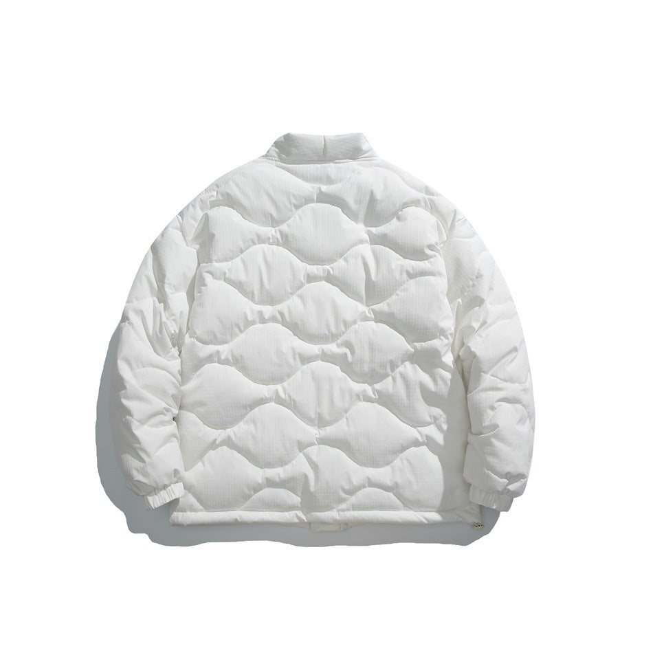 Back view of a white quilted jacket with a short collar and elasticated cuffs.