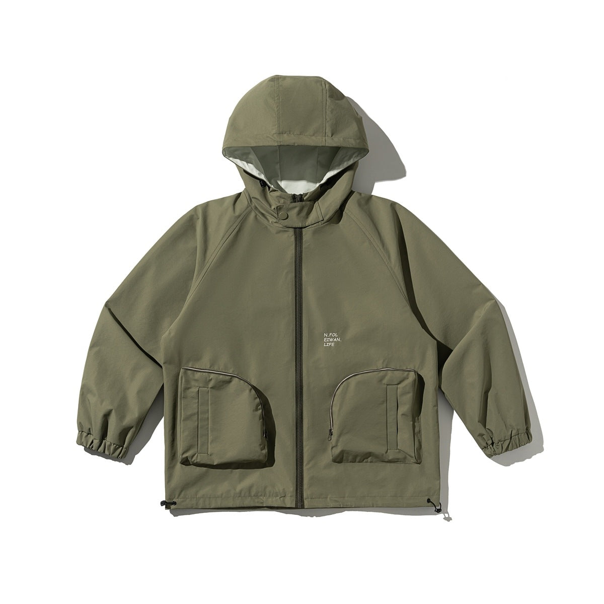 Green hooded zip-up jacket flat lay with two large zippered front pockets, elastic cuffs and drawcord hem