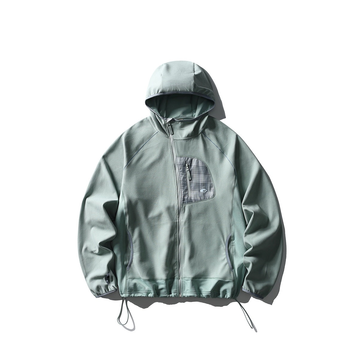 Bean green hooded zip jacket flat lay with gray plaid chest pocket and drawcord hem