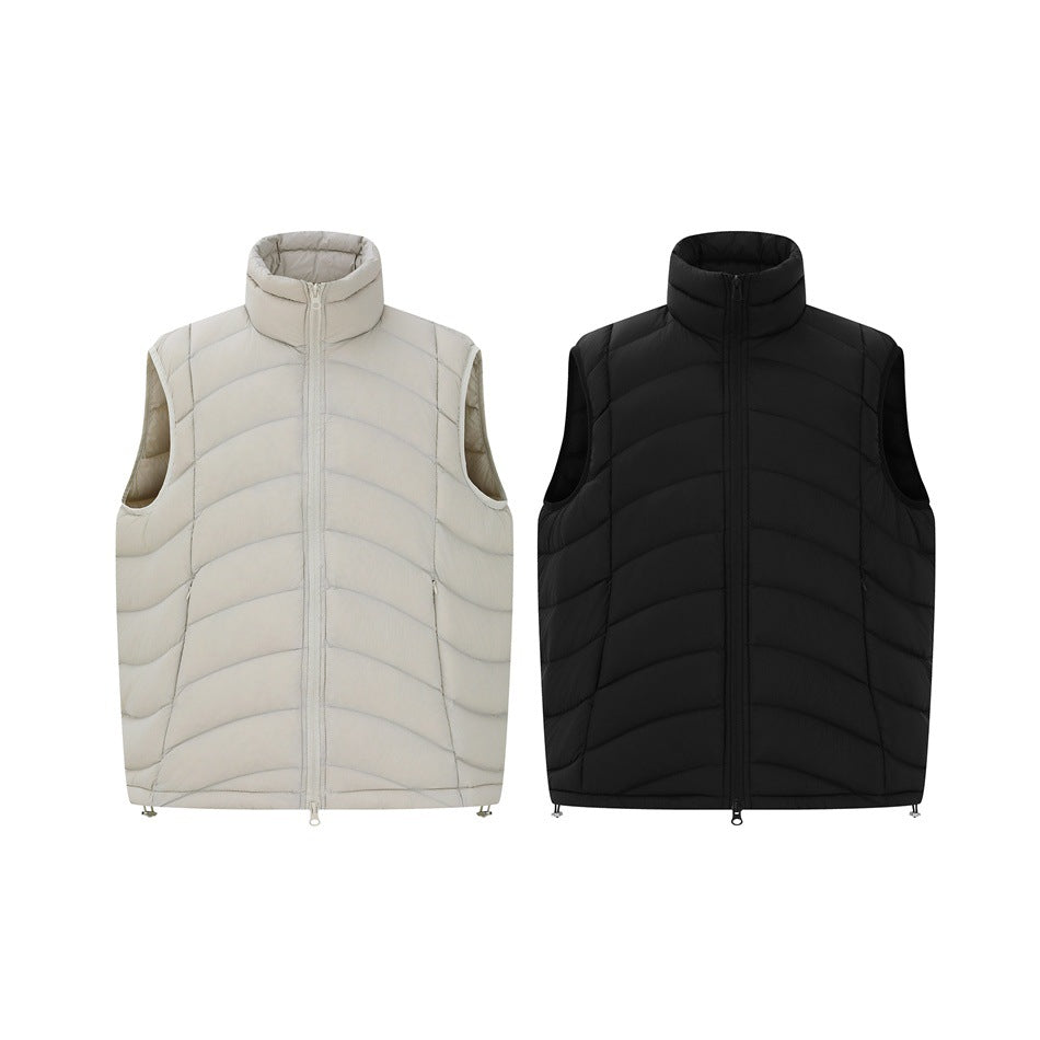 Front views of sleeveless quilted vests in ivory and black, both with stand collars and front zippers.