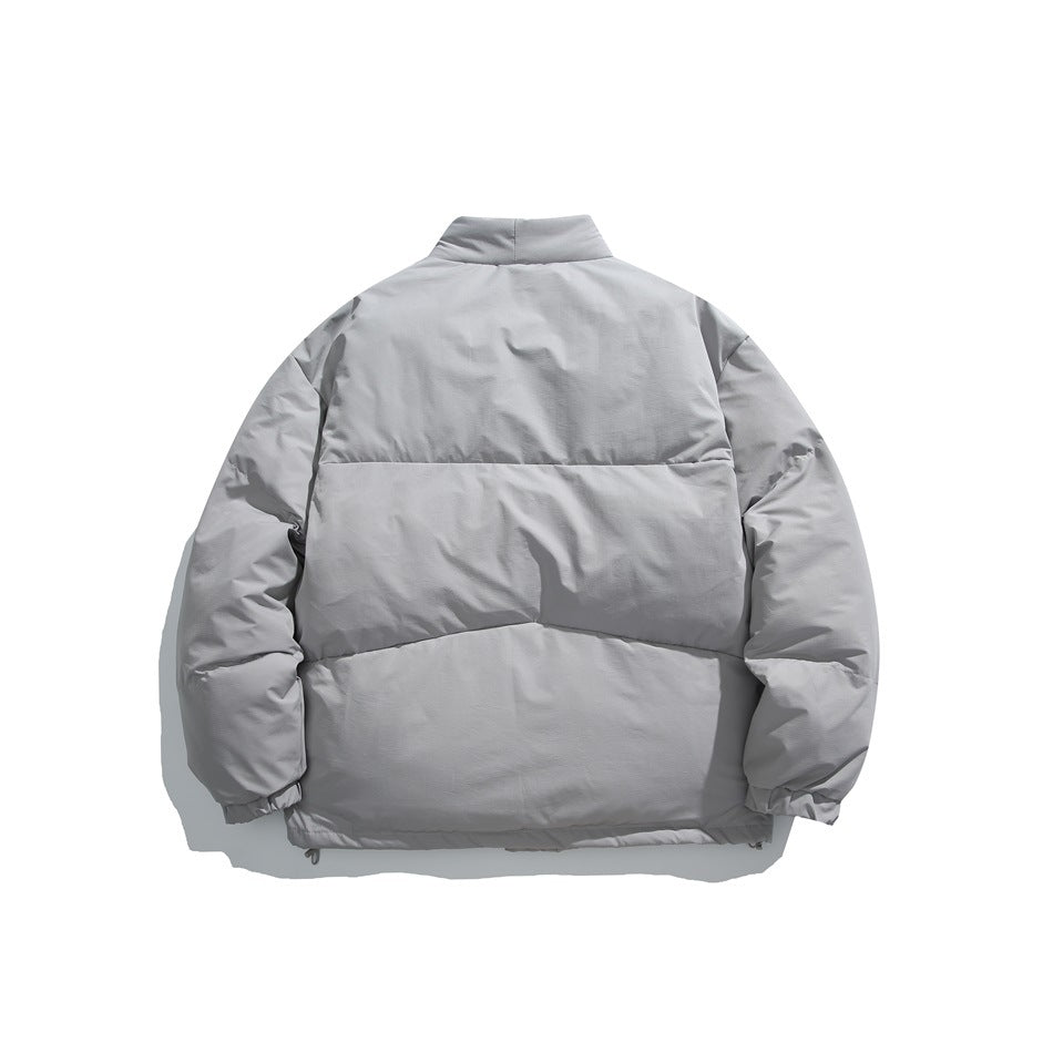 Back view of a light gray padded jacket with broad horizontal panels and elastic cuffs.