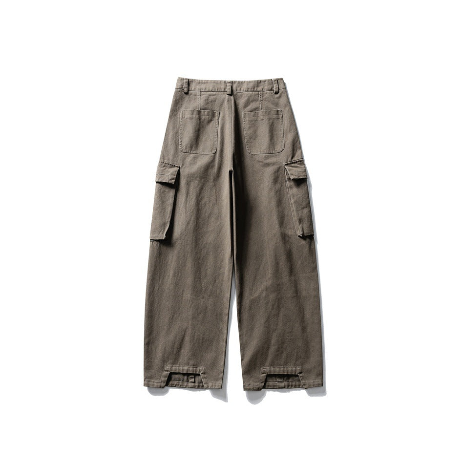 Gray wide-leg cargo pants flat lay, back view, with two patch pockets and hem tab details