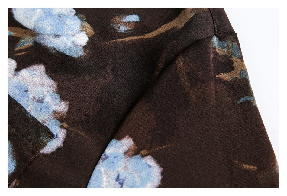 Close-up of the shirt's floral fabric and sleeve seam.