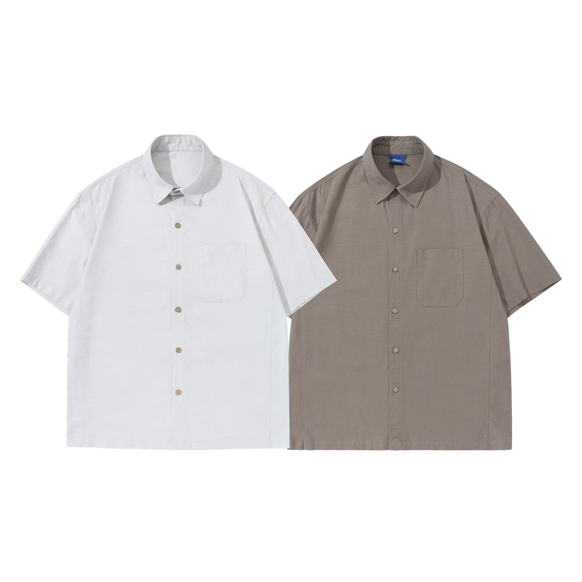 Two short-sleeve button-up shirts shown from the front, one white and one taupe, each with a chest pocket.
